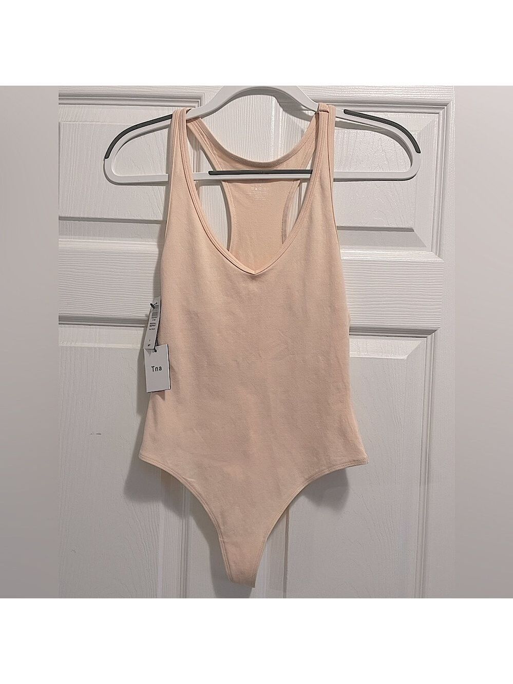 NWT TNA Rockfall Bodysuit Racerback Tank Pale Peach Size Small NEW